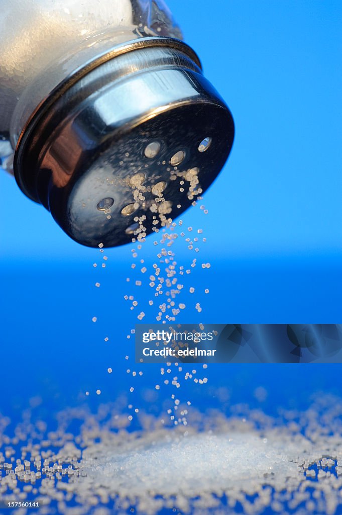 Salt Fallig Salt Falling From A Shaker High-Res Stock Photo - Getty Images