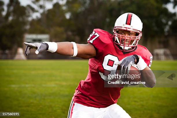 football player celebration dance - touchdown stock pictures, royalty-free photos & images
