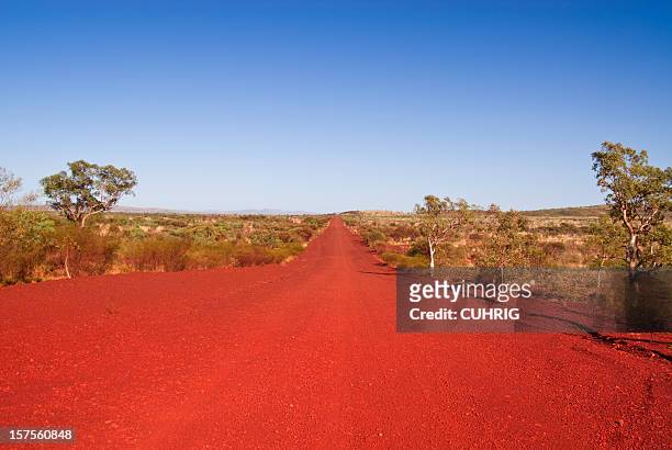 a shot of the outback track in the daytime - australia desert stock pictures, royalty-free photos & images