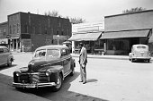 main street of small town USA with cars 1941, retro