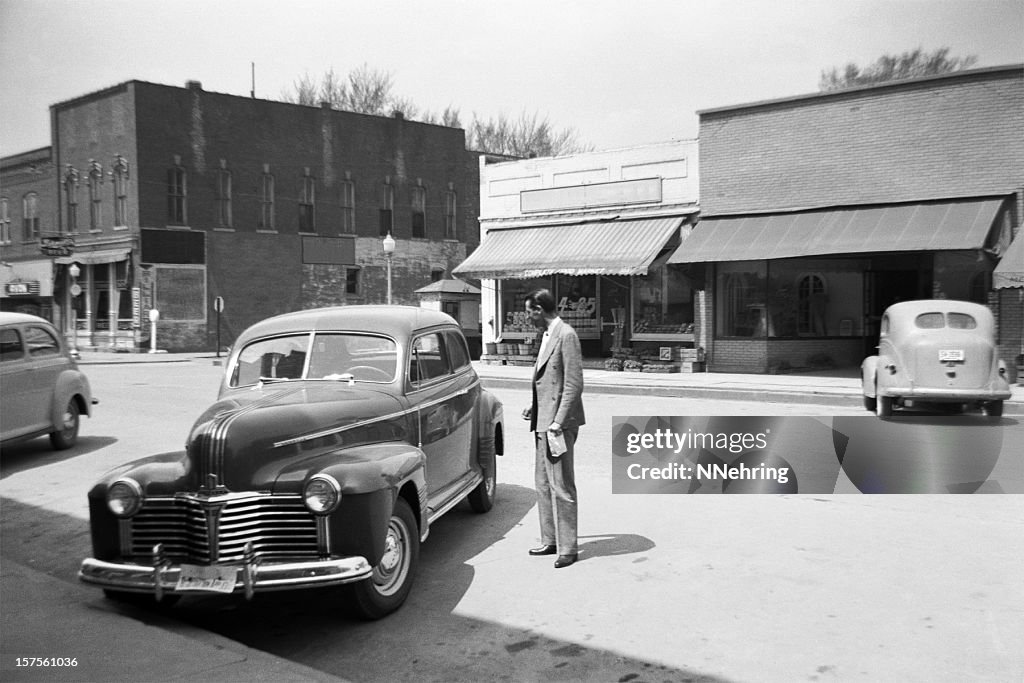 Main street of small town USA with cars 1941, retro