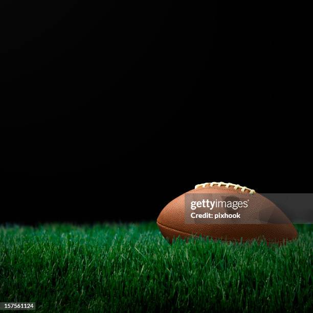 night game - american football field low angle stock pictures, royalty-free photos & images