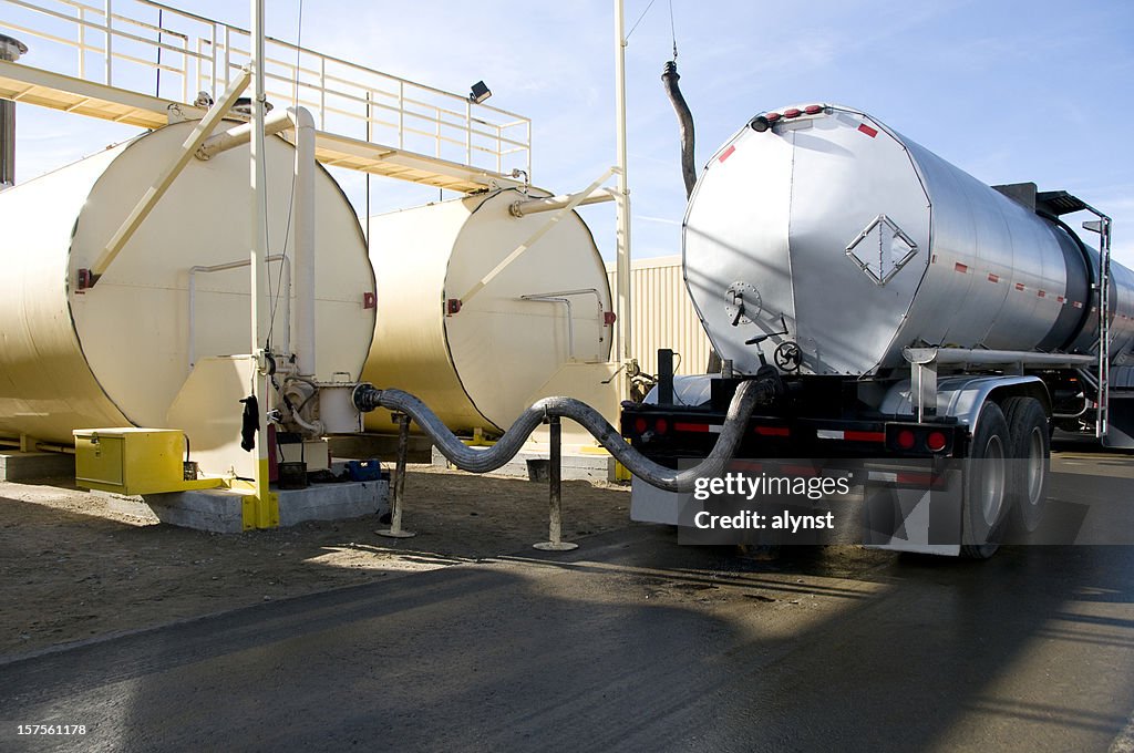 Tanker Transeferring Oil into Fuel Tanks