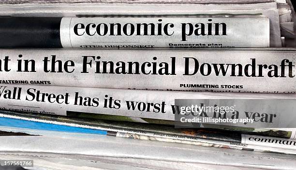 bad economy headlines in newspapers - recession headlines stock pictures, royalty-free photos & images