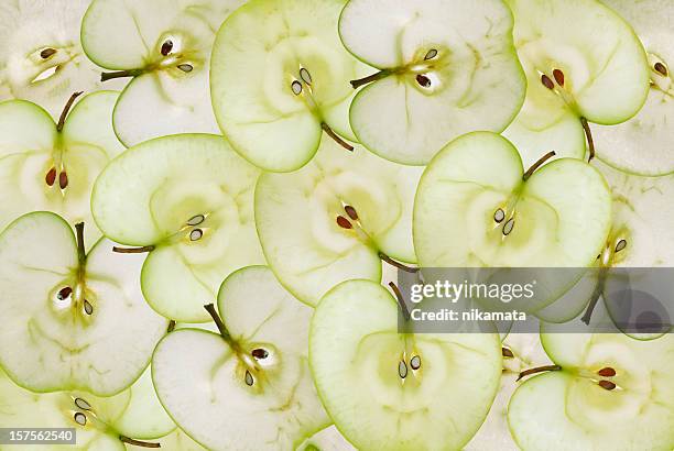 green apple background - green apples stockfoto's en -beelden