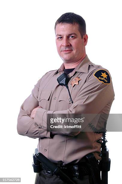 sheriff with crossed arms - police uniform stock pictures, royalty-free photos & images