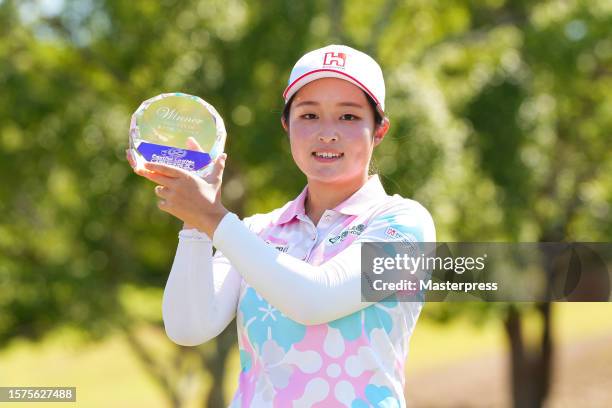 Chia Yen Wu of Chinese Taipei poses with the trophy after winning the tournament following the final round of Castrol Ladies at Fuji Ichihara Golf...