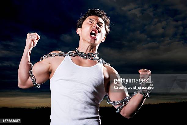 breaking free from the chains that bind - chain stock pictures, royalty-free photos & images