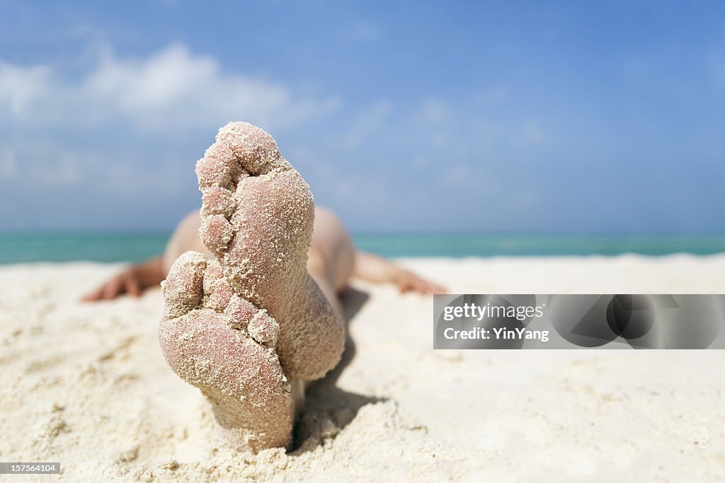 Woman’s Feet Relaxing, Sunbathing on Beach Sand Vacation, Cancun, Mexico