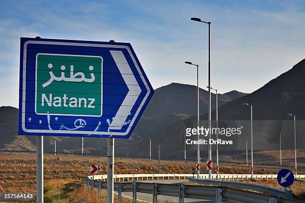 natanz road sign, iran's nuclear site - iran stock pictures, royalty-free photos & images