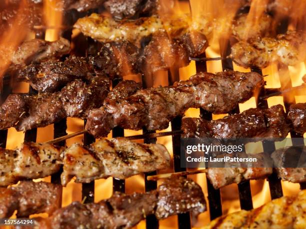 meat skewers on the bbq - souvlaki stock pictures, royalty-free photos & images