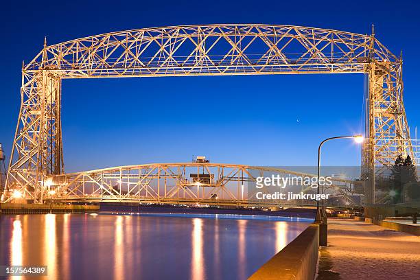 duluth lift bridge in minnesota on lake superior. - duluth minnesota stock pictures, royalty-free photos & images