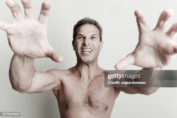 mam showing claws - hand claw stock pictures, royalty-free photos & images