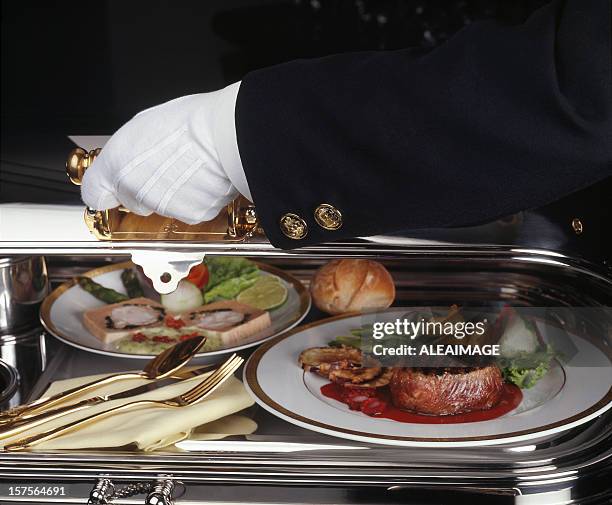 402 Butler Serving Food Stock Photos, High-Res Pictures, and Images ...