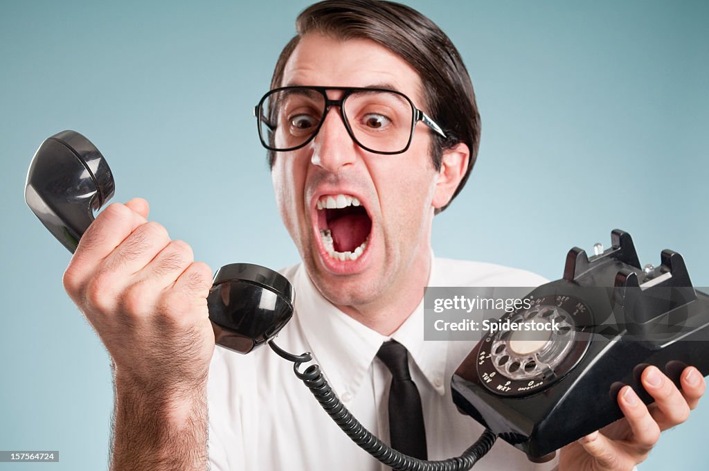 Nerdy Office Worker With Vintage Telephone