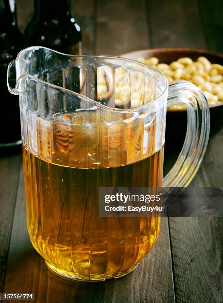 bier-pitcher - beer nuts stock-fotos und bilder