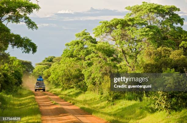 4wd car on an unpaved road in rural africa - democratic republic of the congo bildbanksfoton och bilder