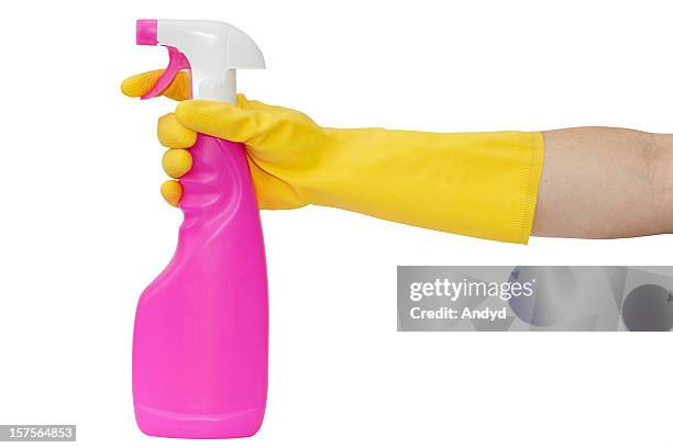 washing up glove holding a spray bottle - washing up glove stock pictures, royalty-free photos & images