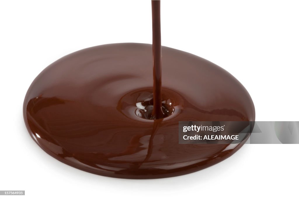 Chocolate being poured onto the surface