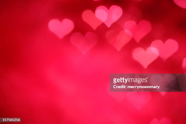 glowing pink hearts - love stock pictures, royalty-free photos & images