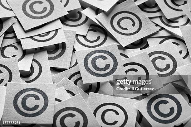 various copyright sign on a square paper - rights bildbanksfoton och bilder