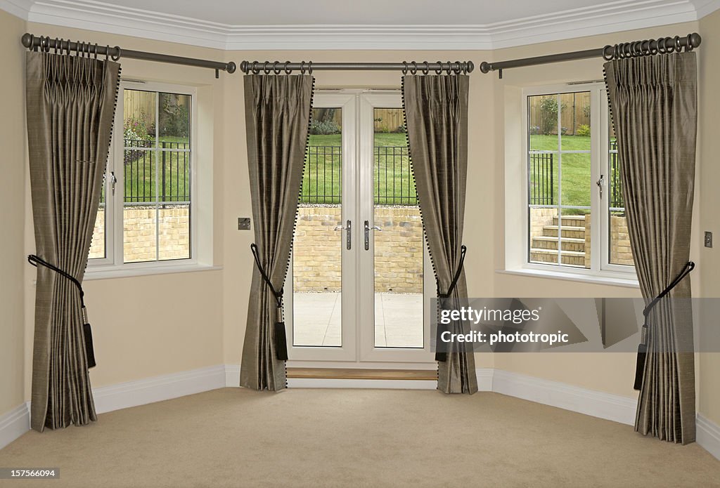 Silk curtains and bay windows