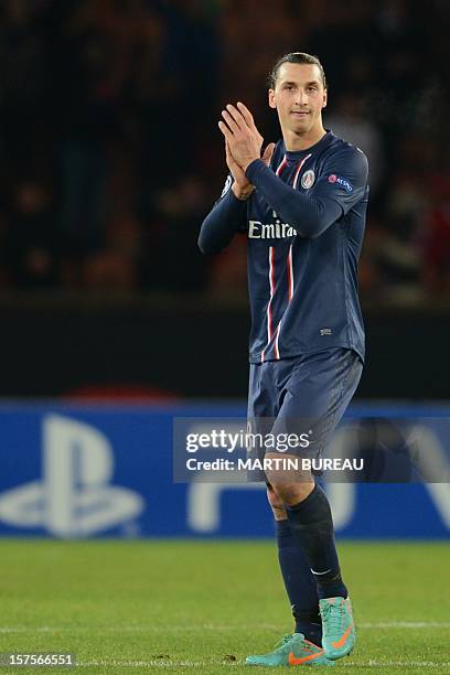 Paris Saint-Germain's Swedish forward Zlatan Ibrahimovic applauds the public, on December 4, 2012 at the Parc des Princes Stadium in Paris, at the...