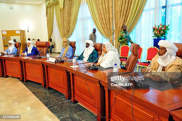 Representatives of various groups and delegations attend a mediation meeting with members of the Malian government, the islamist Ansar Dine group,...