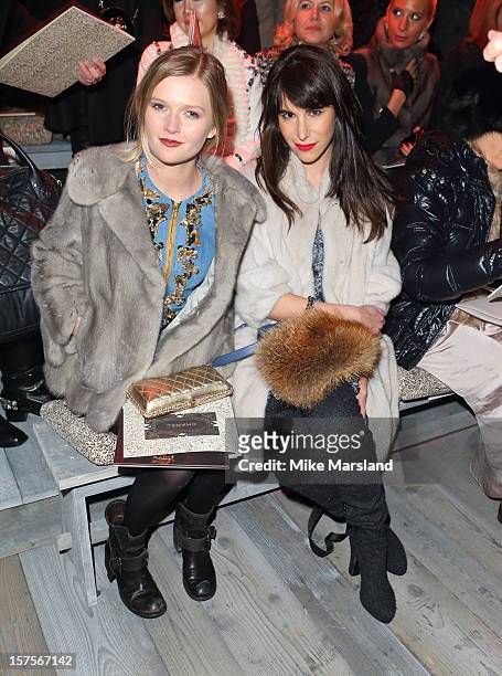 Sophie Kennedy-Clark and Caroline Sieber attend the CHANEL: Metiers d'Art fashion show at Linlithgow Palace on December 4, 2012 in Linlithgow,...