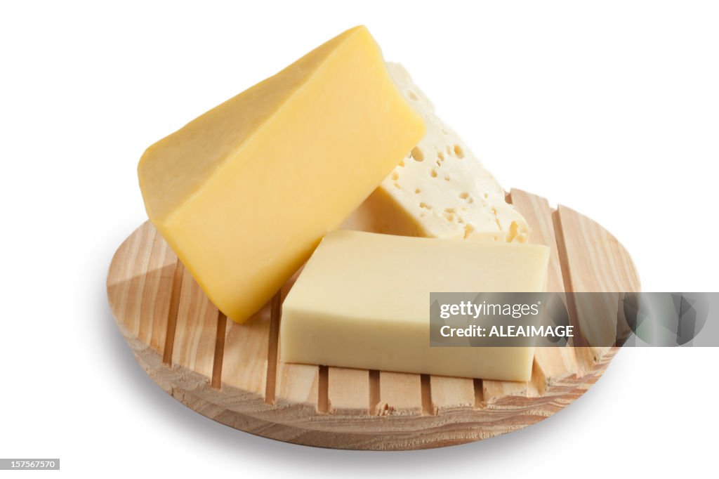 Cheese blocks on a cutting board