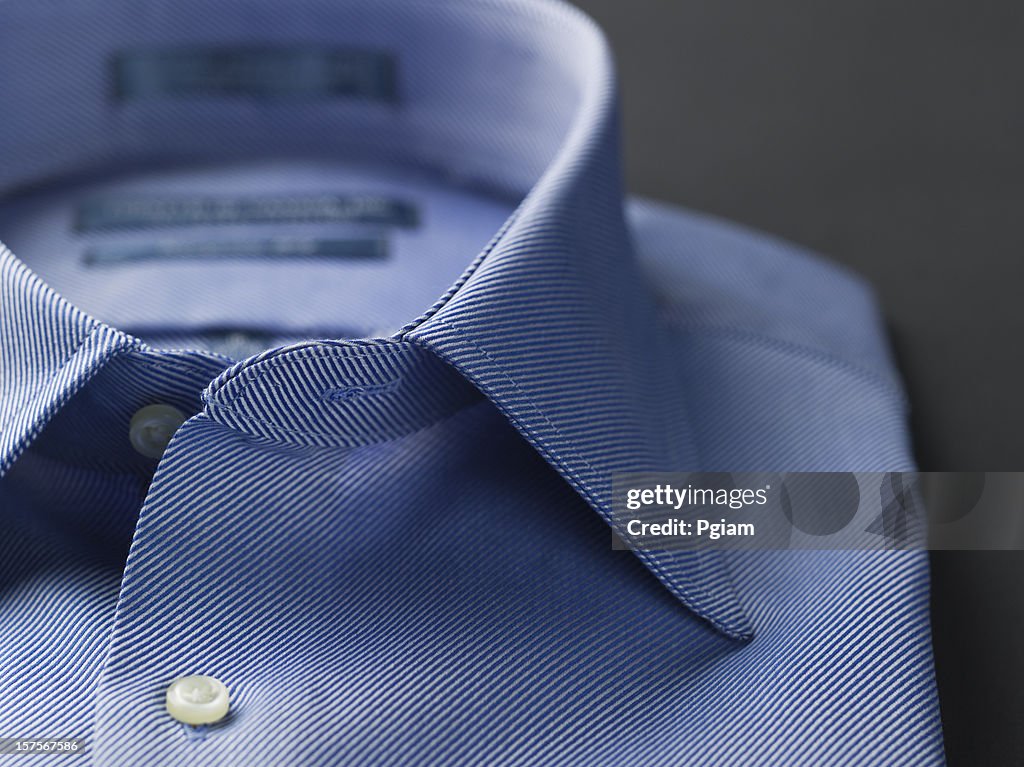 Close up of a blue mens shirts