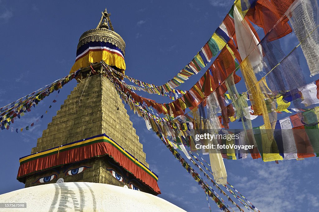 Colorful traditional Buddhist prayer flags golden stupa temple Bhaktapur Nepal