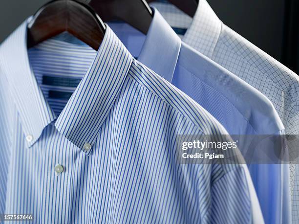 clothes on a hanger - dry cleaning stock pictures, royalty-free photos & images