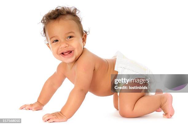 baby in the crawling position - baby crawling stock pictures, royalty-free photos & images