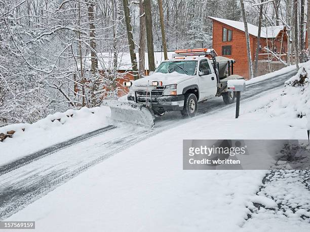 snowplow on an ice road with lights - snow plow stock pictures, royalty-free photos & images