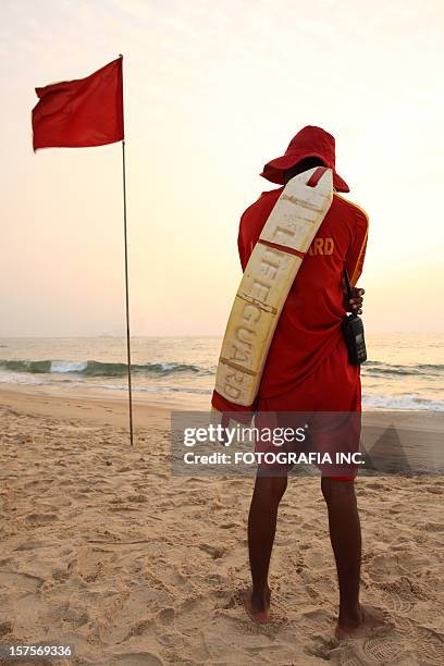 lifeguard on the beach - beach lifeguard stock pictures, royalty-free photos & images