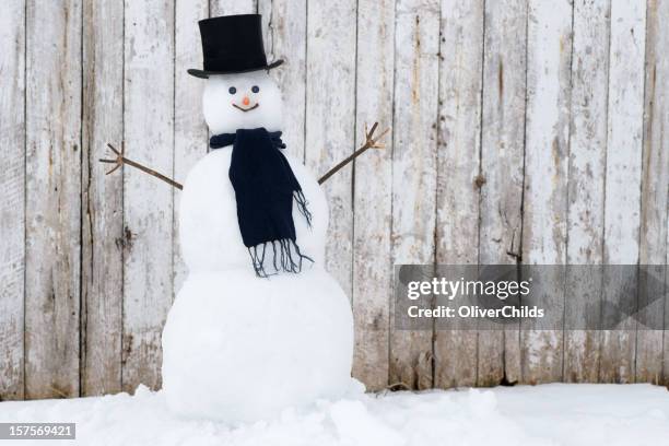 traditional snowman. - snowman stock pictures, royalty-free photos & images