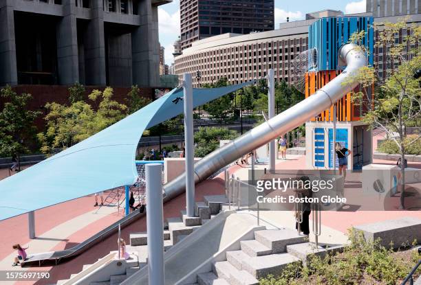 Boston, MA A child rides a giant slide at City Hall Plaza. A viral video of a BPD officer's bumpy ride on an extra-large slide at City Hall Plaza is...