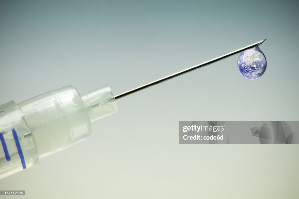 Shooting up earth, globe dripping out syringe (drugs medicine concept)