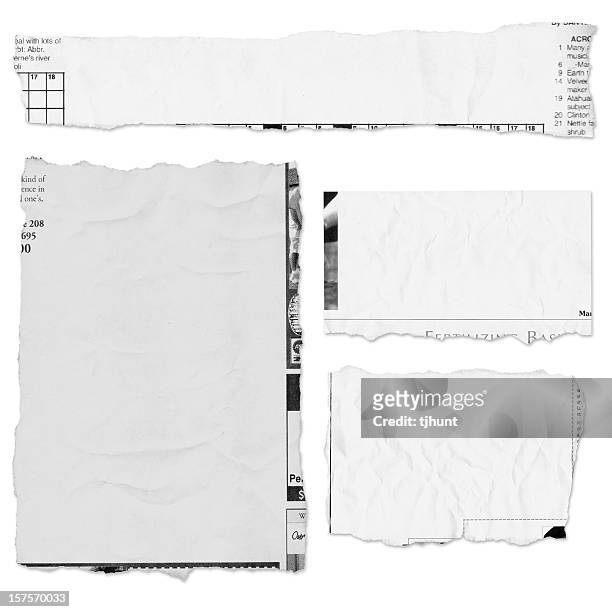 four pieces of a torn newspaper page on white background - newspaper stock pictures, royalty-free photos & images