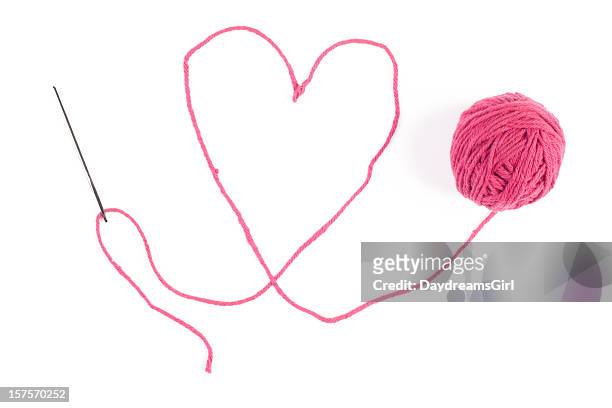 yarn heart - sewing needle stock pictures, royalty-free photos & images