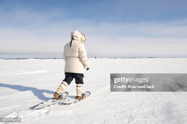 arctic snowshoeing, yellowknife. - snowshoeing stock pictures, royalty-free photos & images