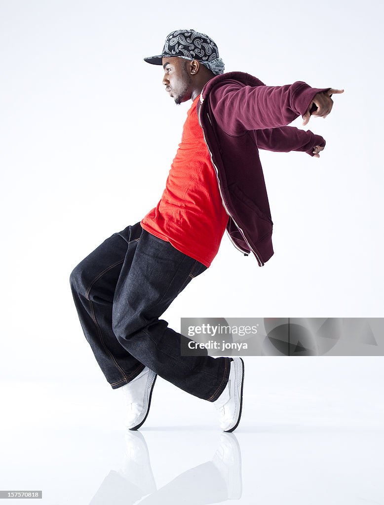 Hip hop dancer standing on his toes