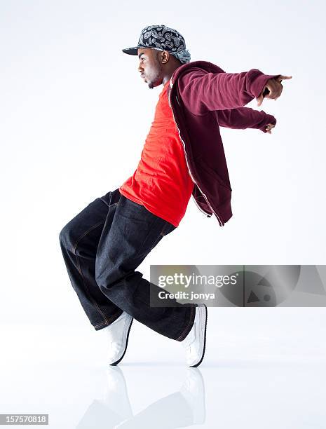 hip hop dancer standing on his toes - dancing white background stock pictures, royalty-free photos & images