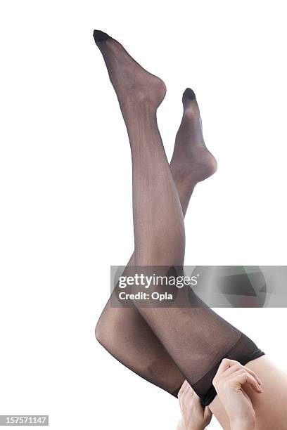 legs of a young woman donning black panties - strumpbyxor bildbanksfoton och bilder