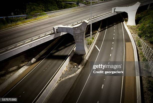 freeway flyover at night - auckland motorway stock pictures, royalty-free photos & images