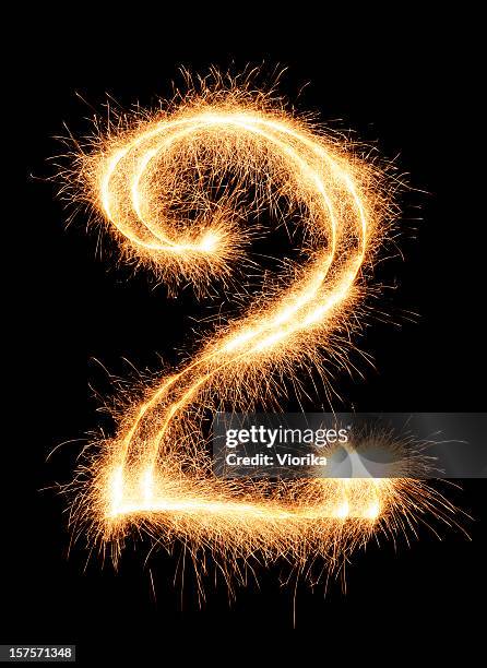glitzernde nummer 2 - ziffer 2 stock-fotos und bilder