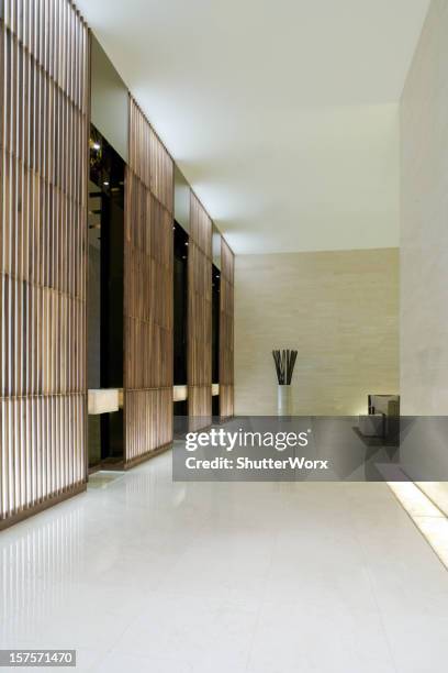 modern elevator lobby - apartment entry stock pictures, royalty-free photos & images