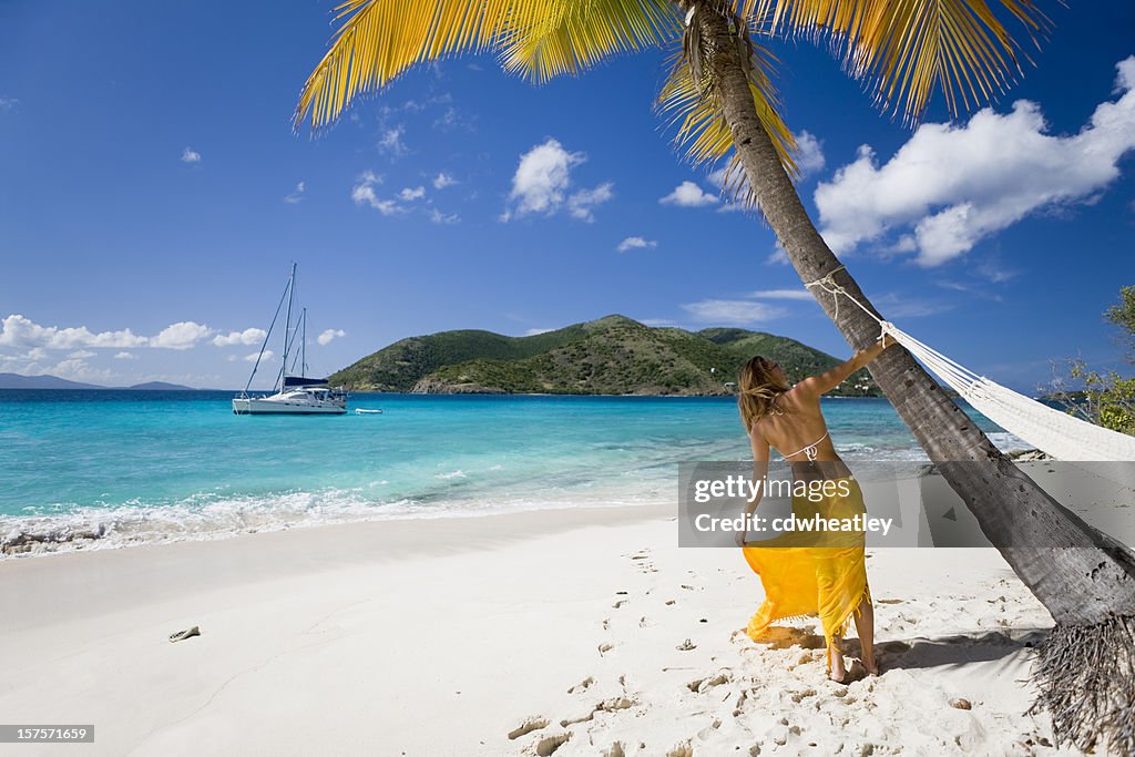 Woman having fun on the tropical Caribbean beach