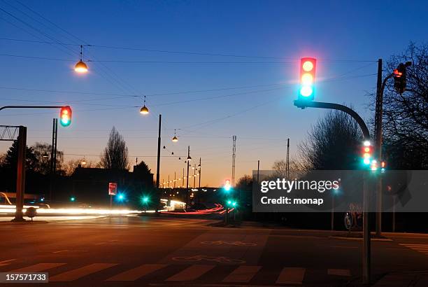 street light at dusk - road signal stock pictures, royalty-free photos & images